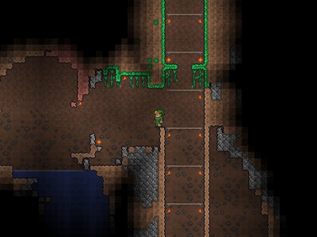 Terraria_mining_cave_to_hellevator